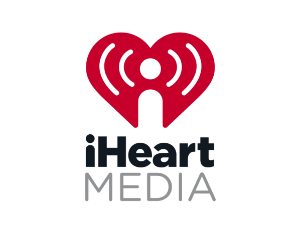 IHeartMedia logo featuring a red heart icon above the company name.